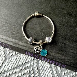 Pandora bracelet with charms